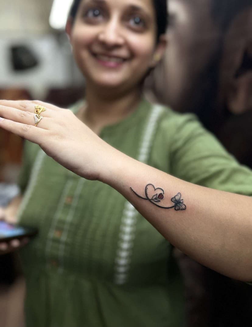 Fine line custom tattoo by The Ink Man